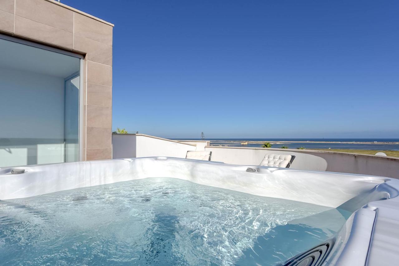 Appartamento Penthouse Quilha Fuzeta Esterno foto